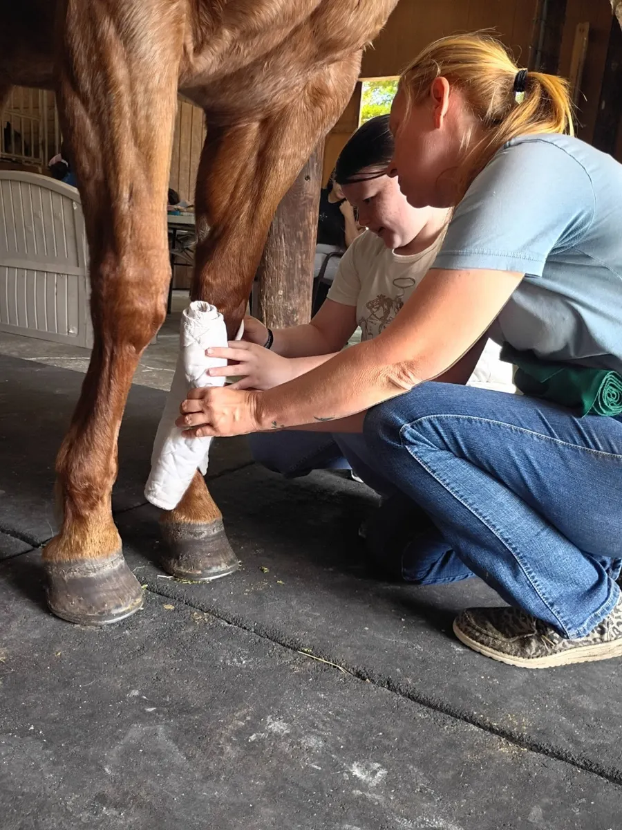 Students practicing leg wrapping